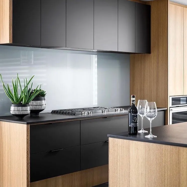 Dark kitchen with wood accents