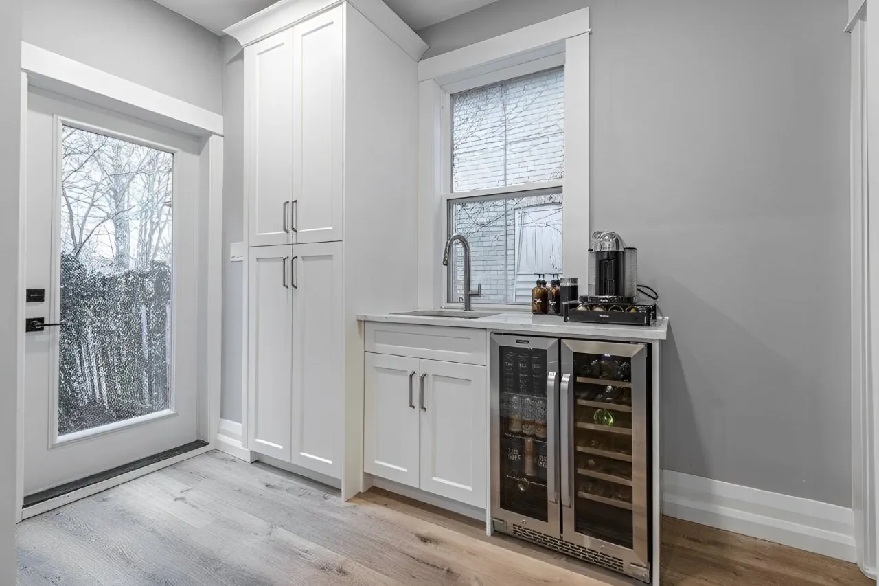 Pantry with a beverage fridge